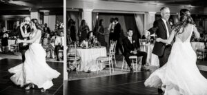 groom watching his bride dance with her dad