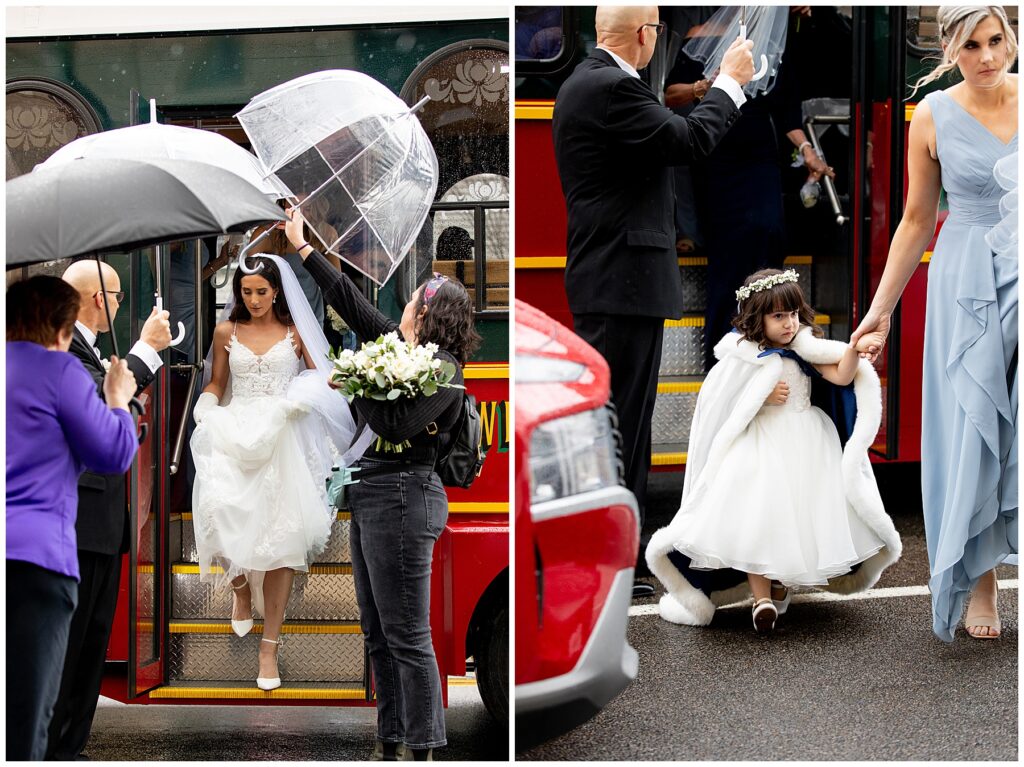bride walking into her wedding ceremony on a rainy day