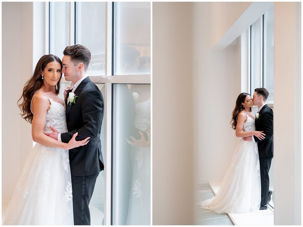 bride and groom pose for photos by the floor to ceiling windows at the Newport Marriott hotel 