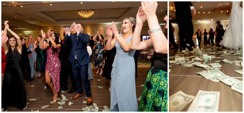 wedding guests clap and dance with the couple in the ballroom 