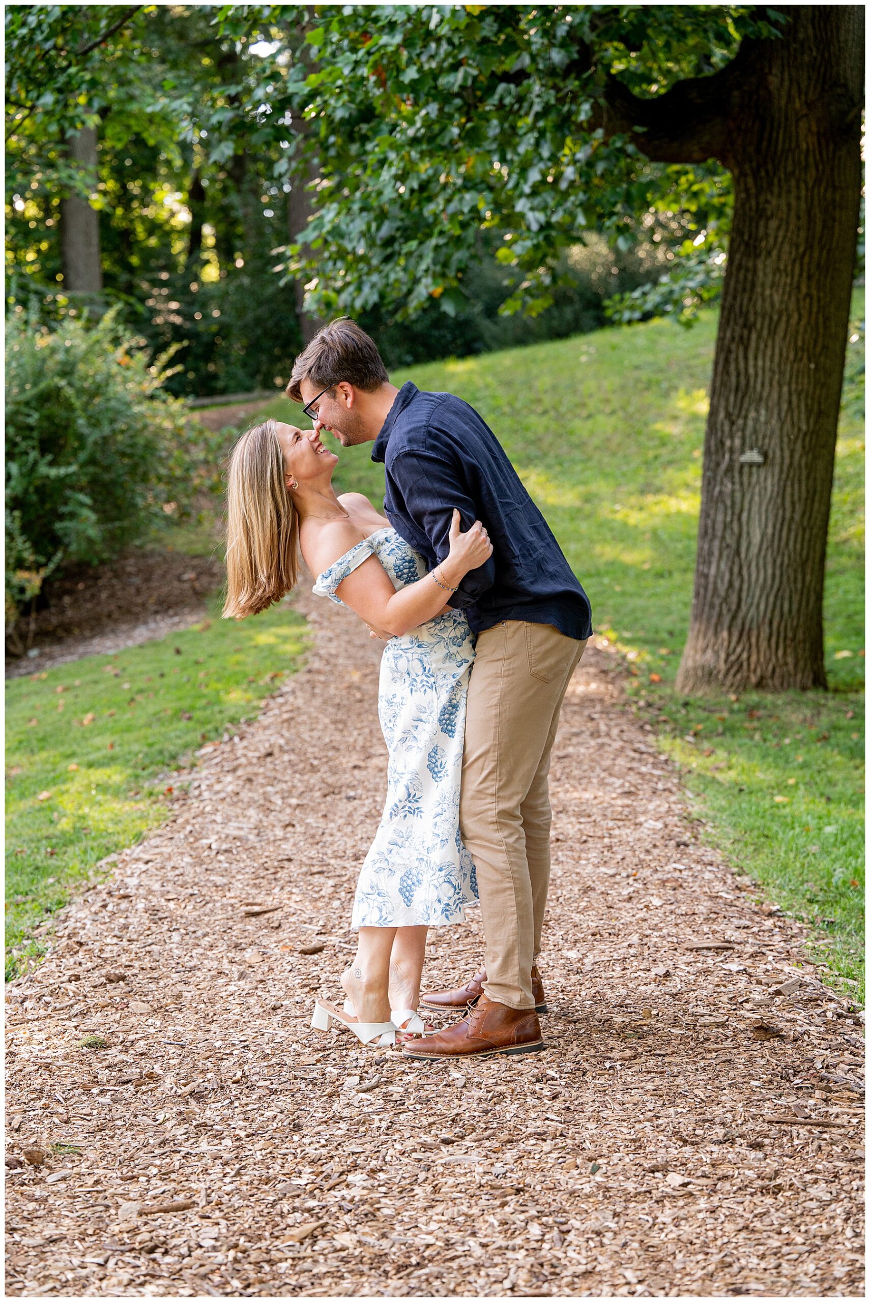 couple laughing during their Engagement Session at Arnold Arboretum 