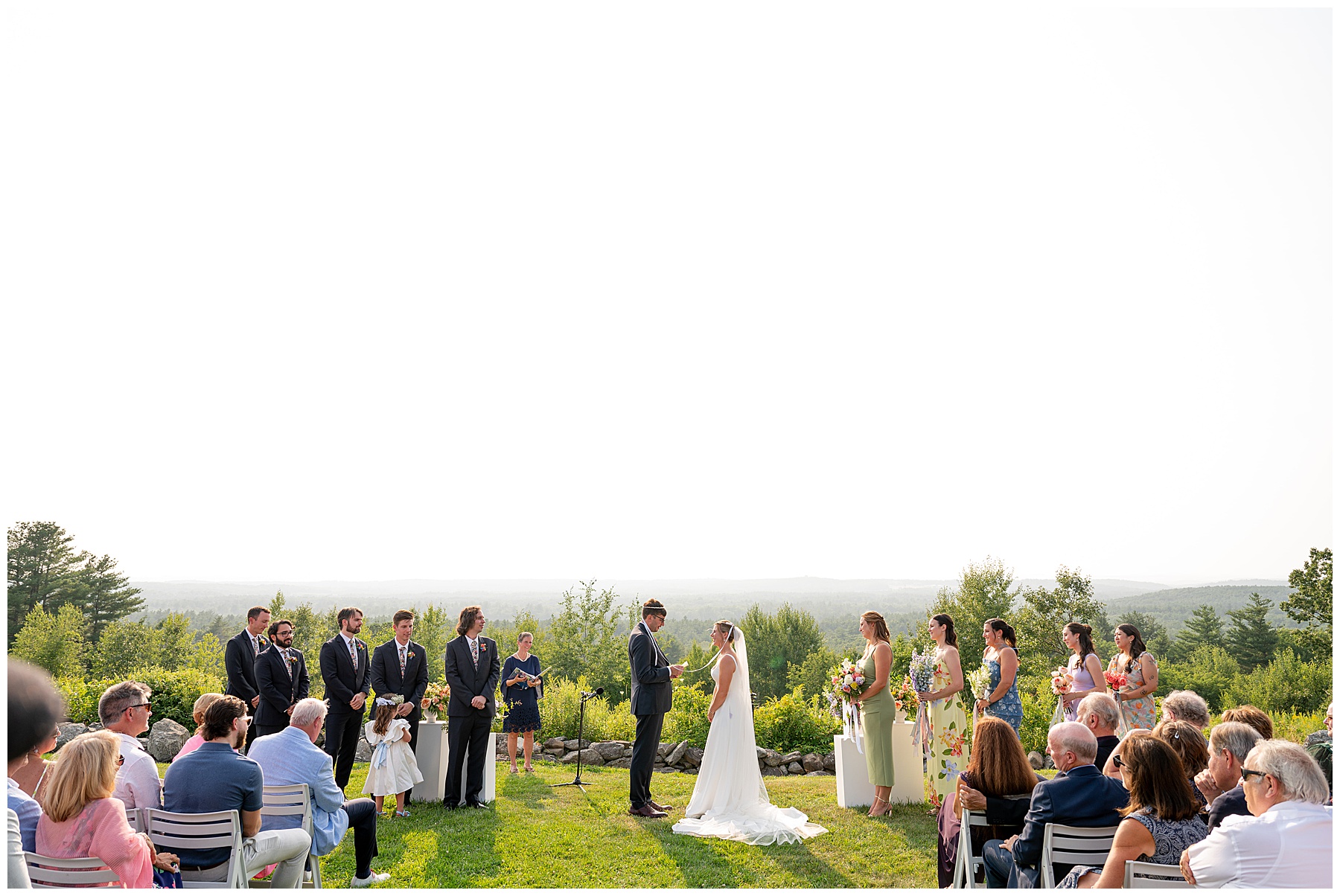 bride and groom reading their vows to each other during the ceremony at Fruitlands Museum venue 