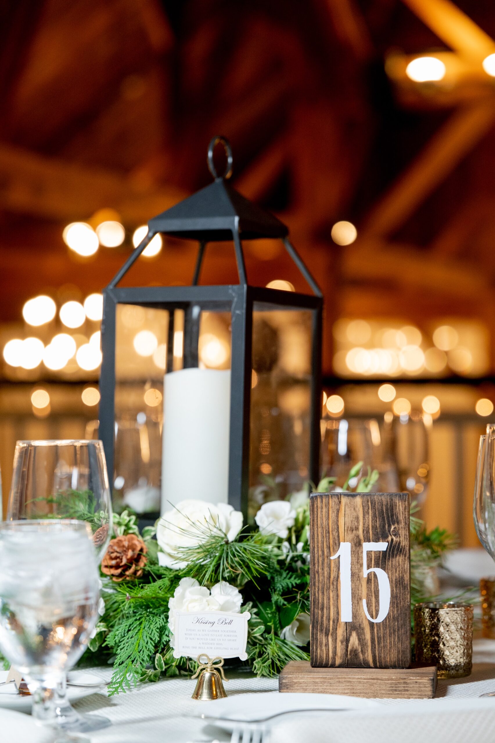 Winter Wonderland Wedding reception decor of pine cones and candles 