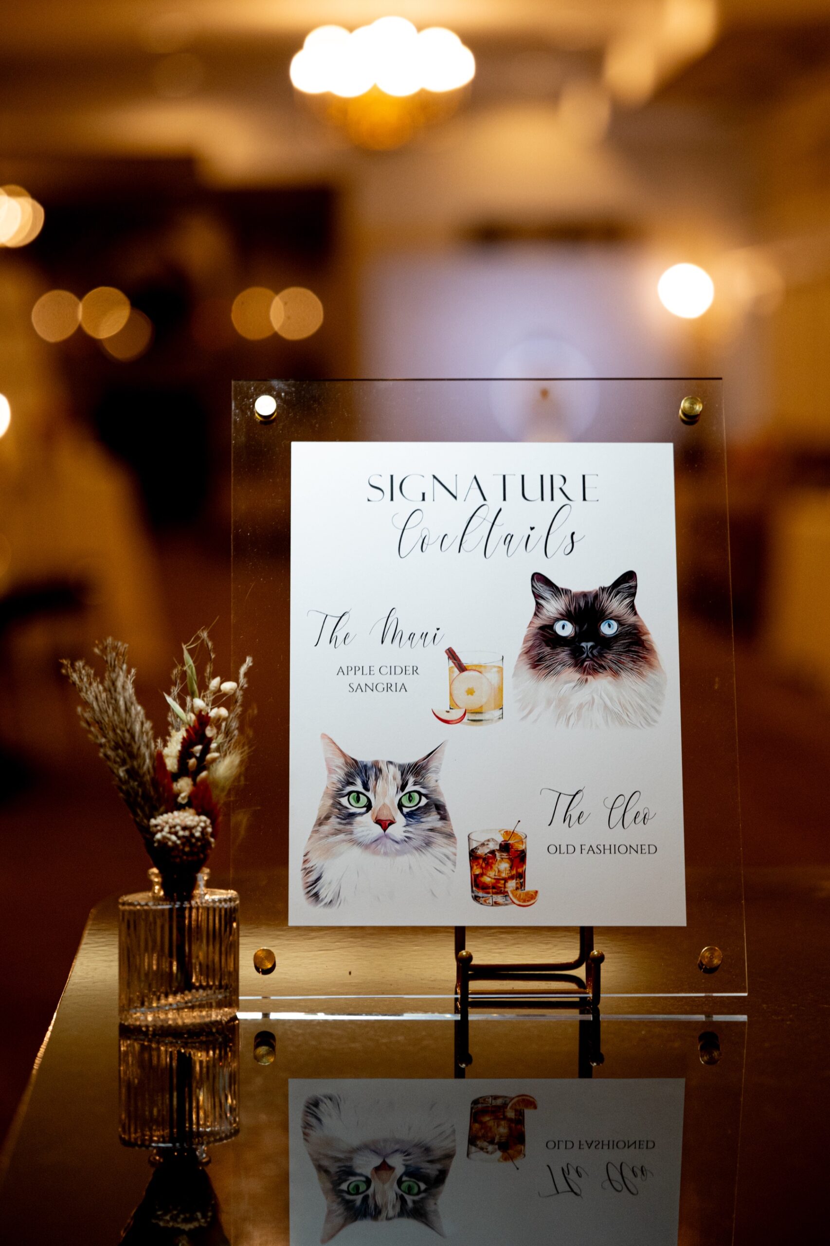signature cocktails signage with cats