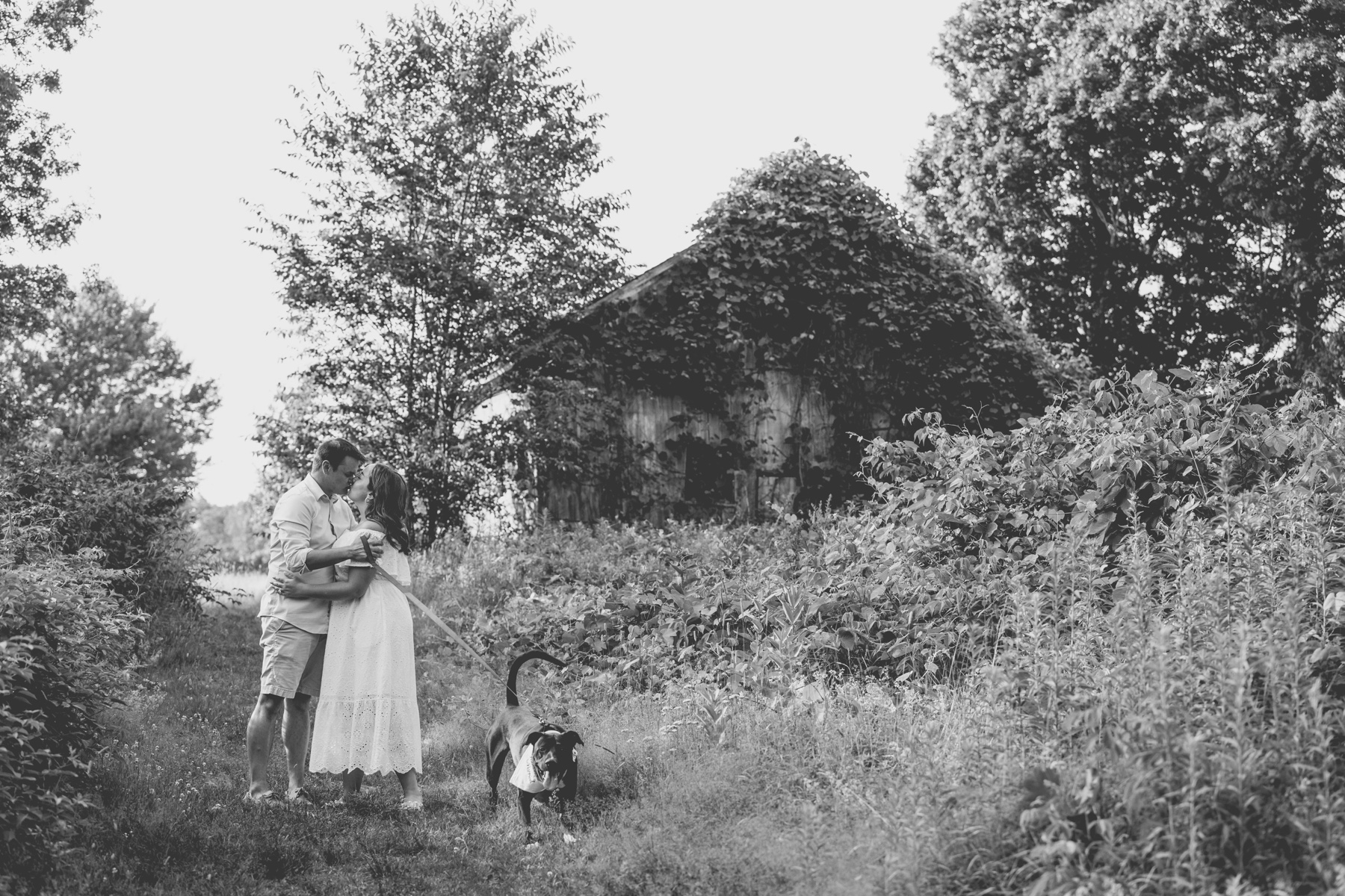 couple kissing at Shaw Farm during their engagement session