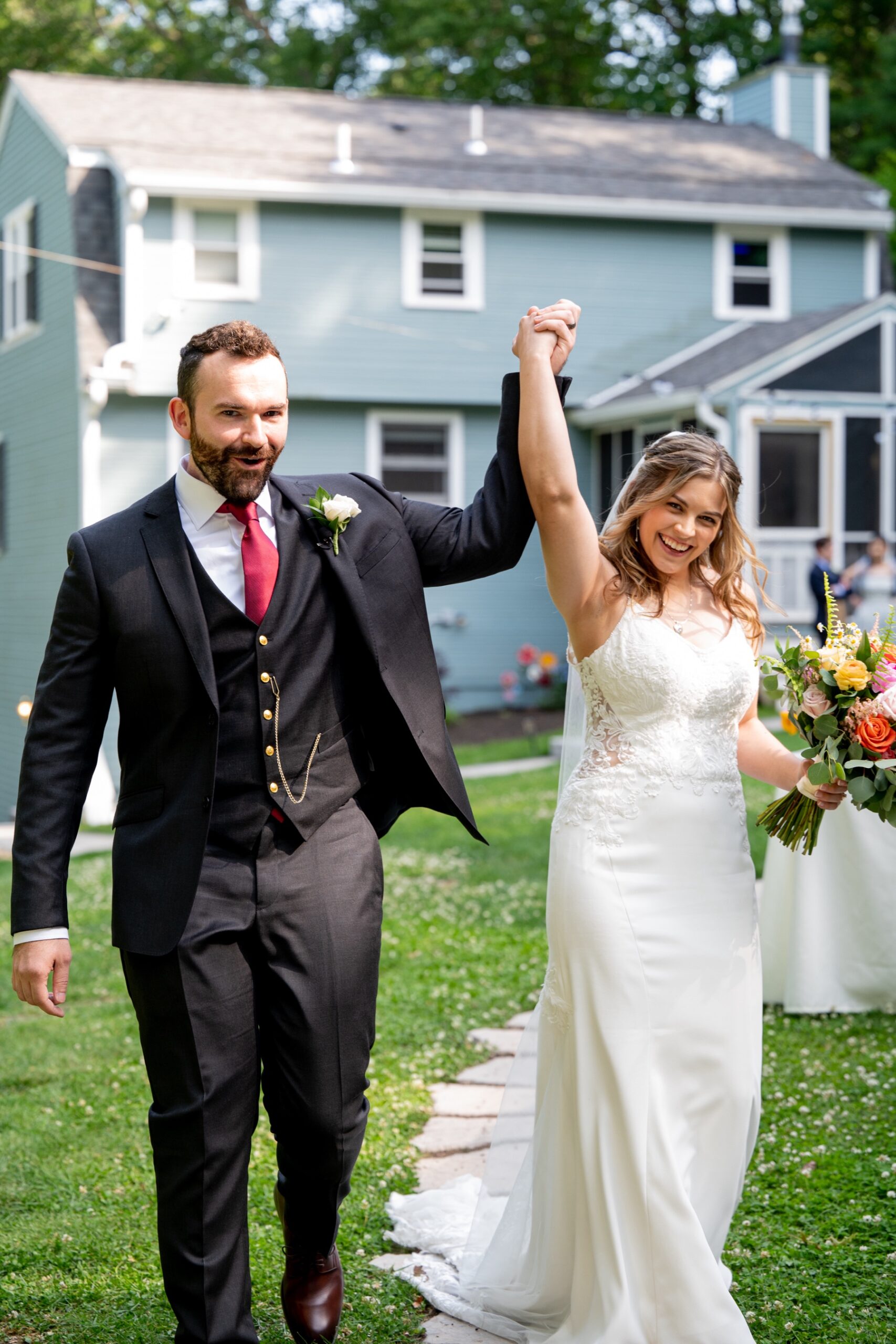 bride and groom celebrating after wedding ceremony 