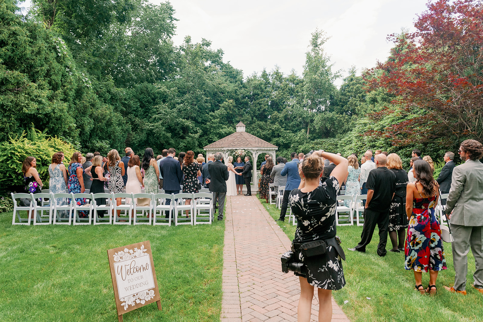 wedding photographer taking pictures of wedding ceremony