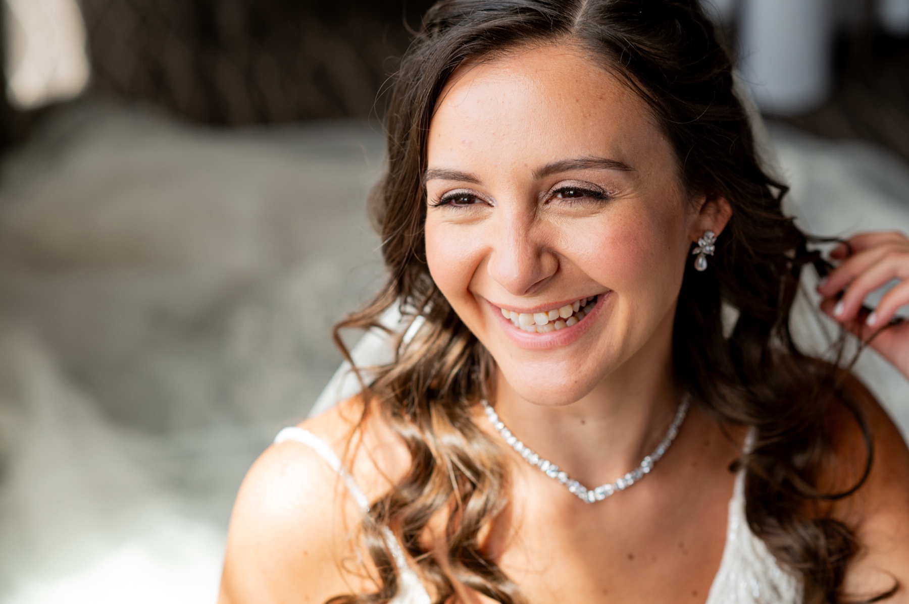 bride smiling in her wedding dress