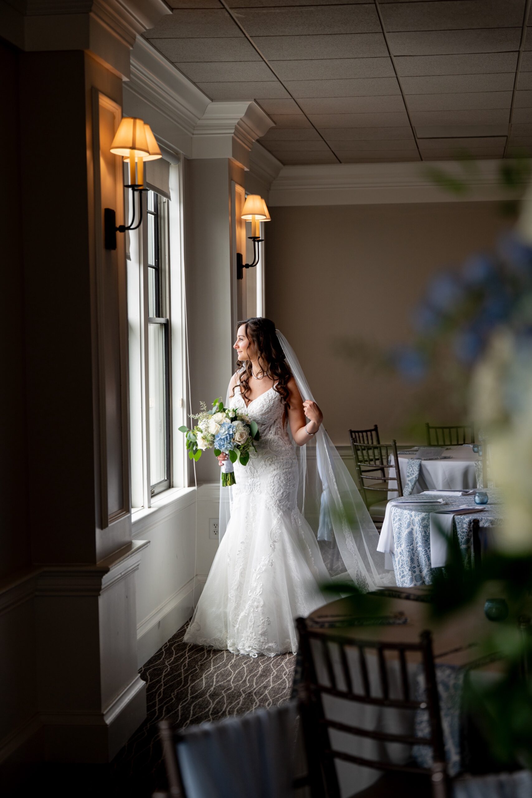 bride standing in reception space of Harbor Lights Wedding in Warwick RI