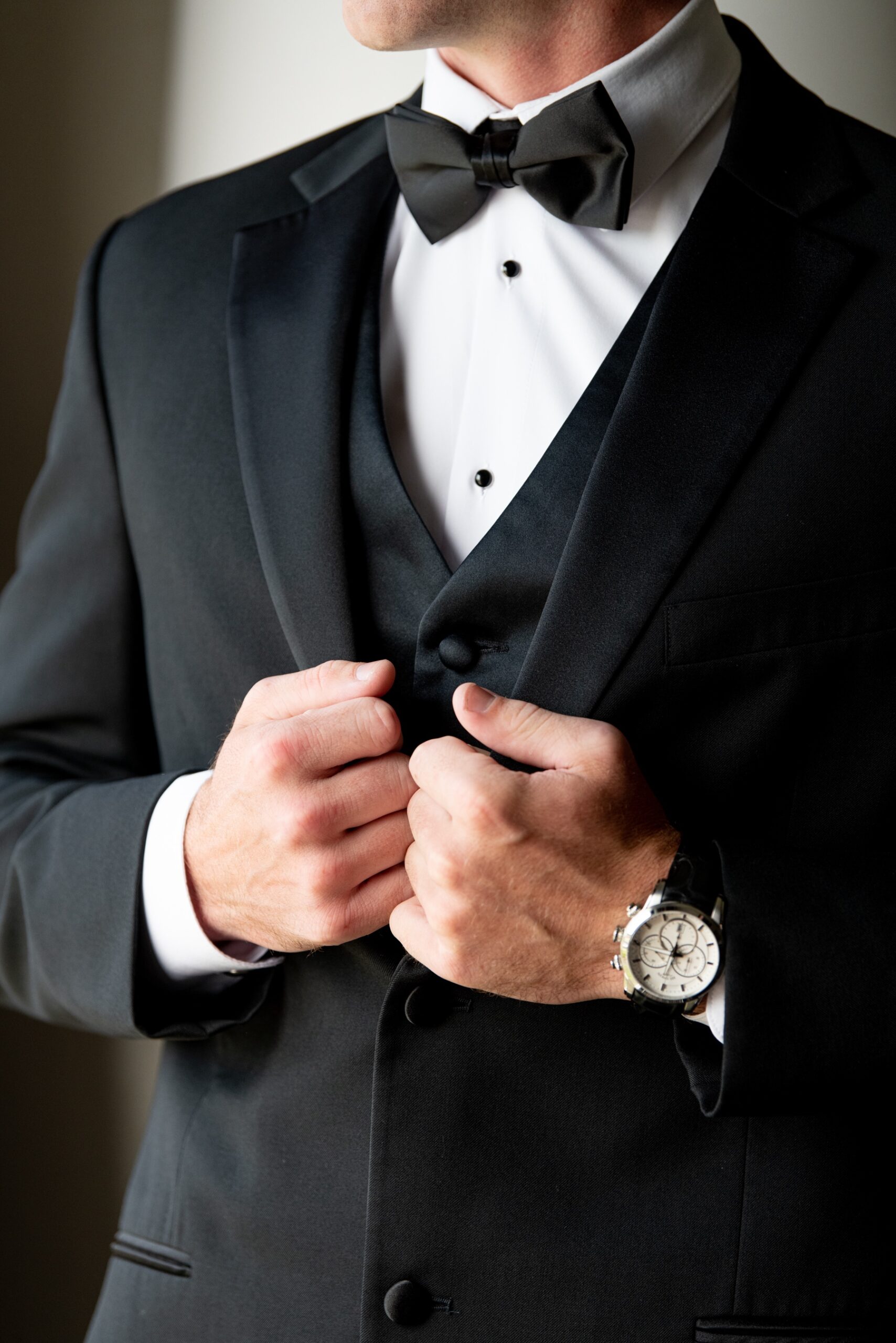 detail shot of groom's tuxedo and bowtie