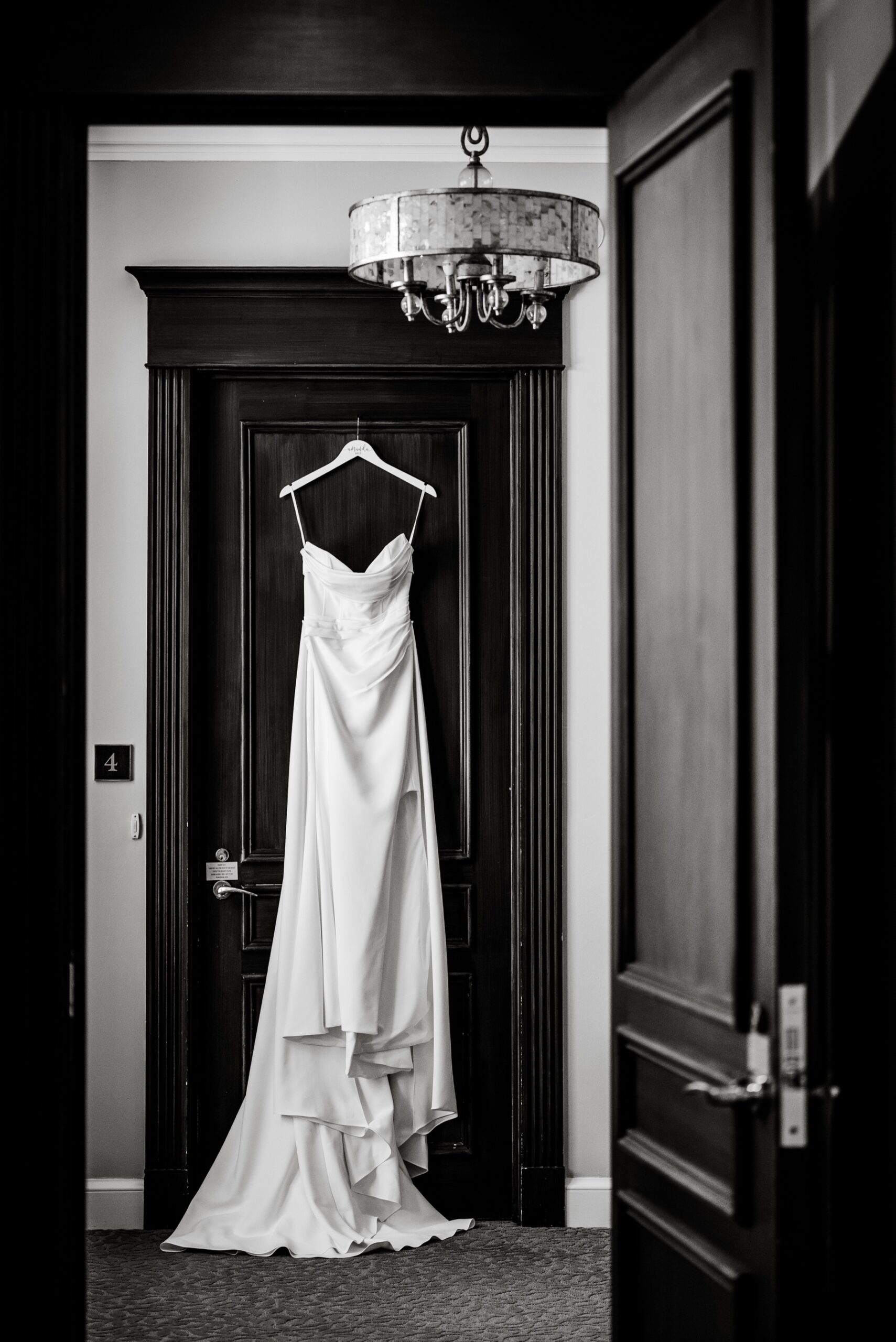 wedding dress hanging up for a Willowbend Cape Cod Wedding