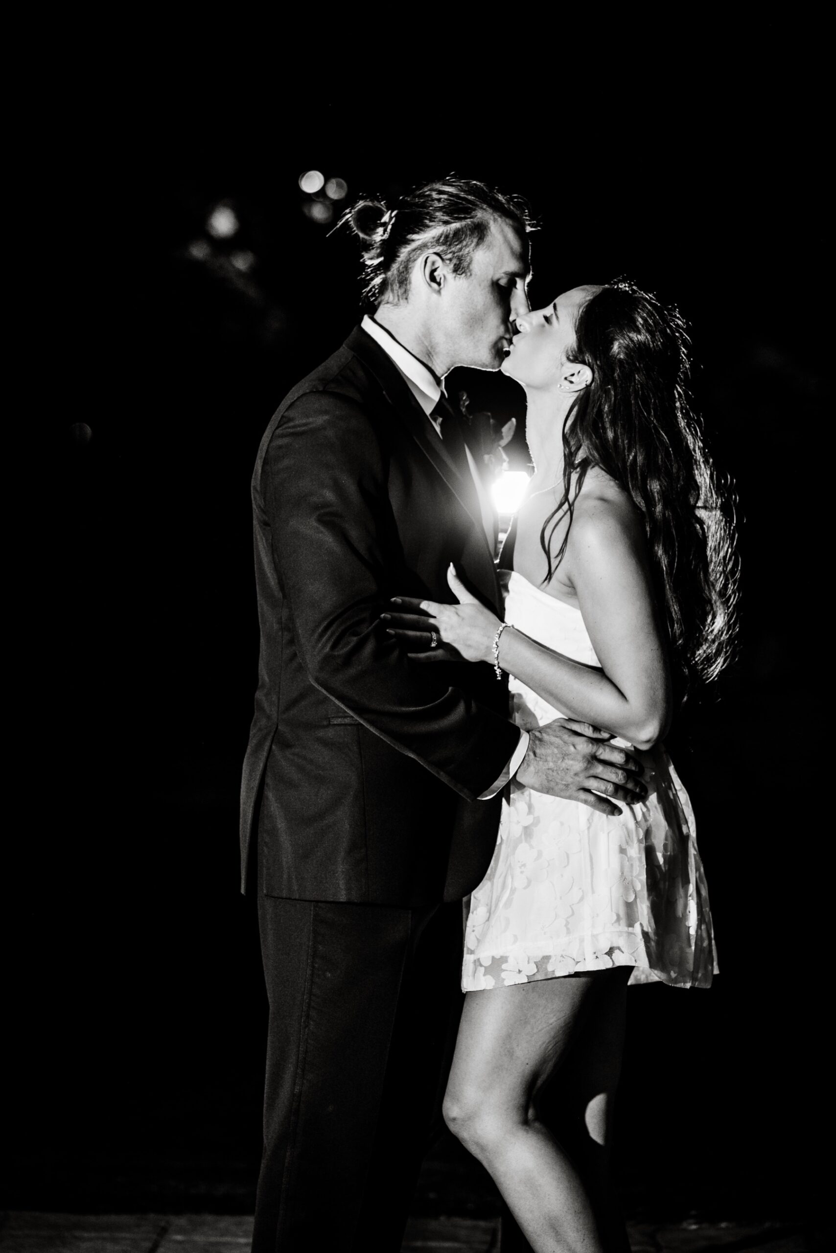 bride & groom kissing in the night at their Willowbend Cape Cod Wedding 