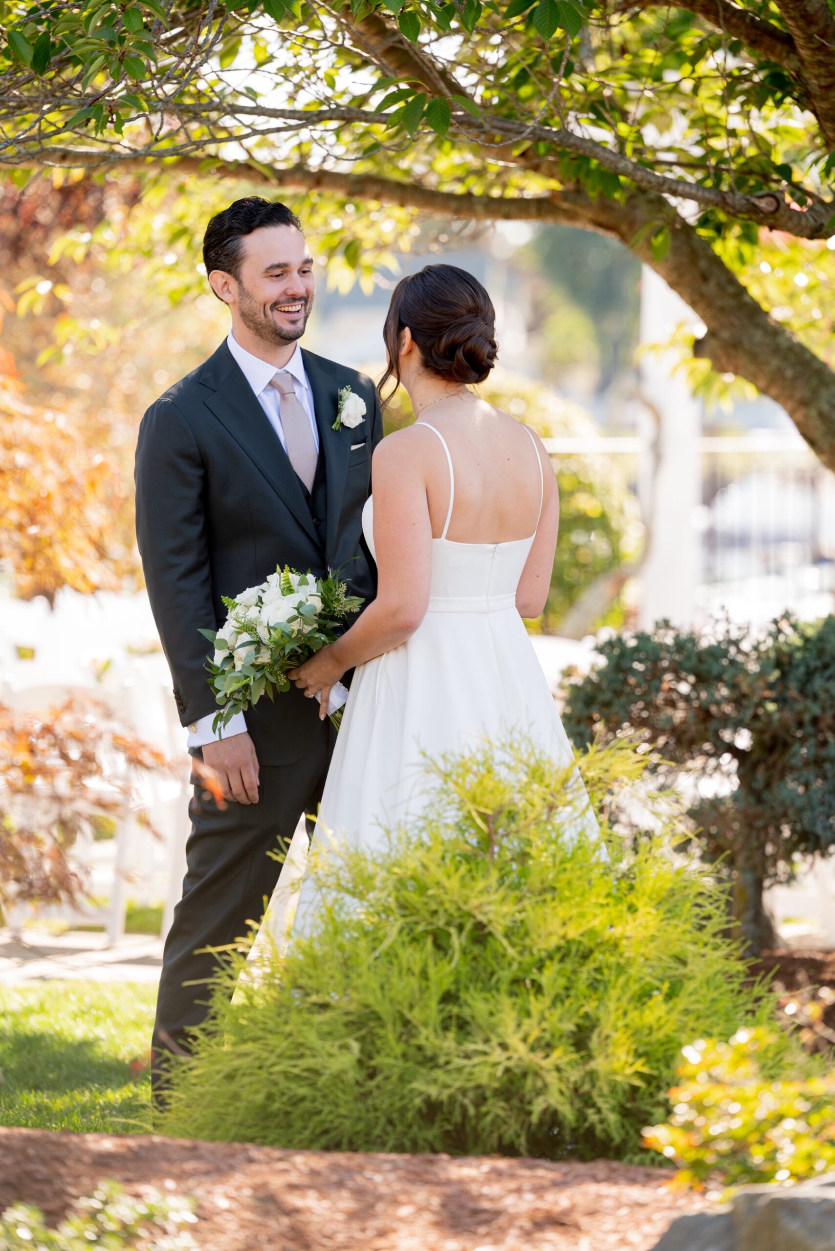 bride and groom during their first look at Terrace Ballroom at Danversport