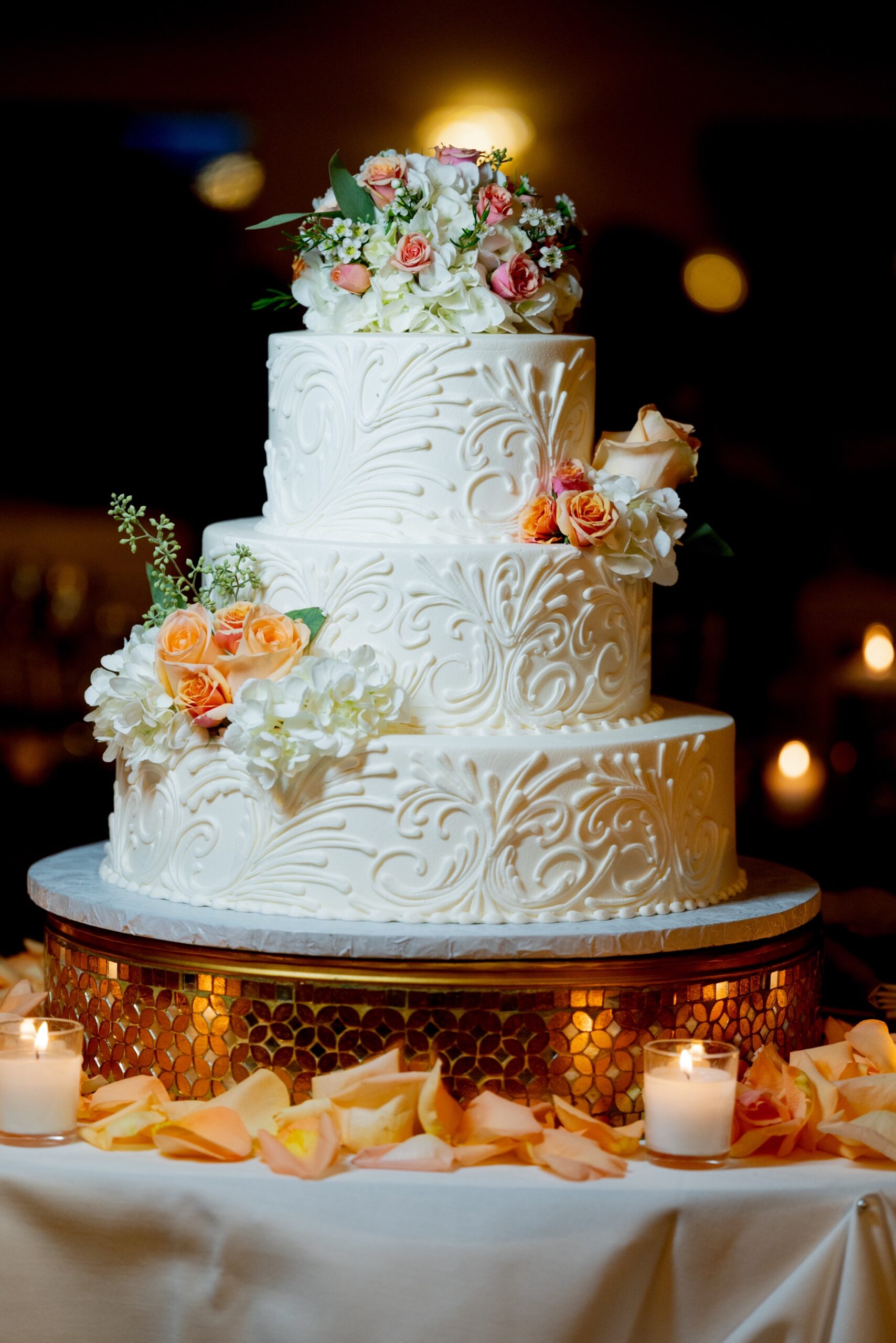 white wedding cake in the Terrace Ballroom at Danversport