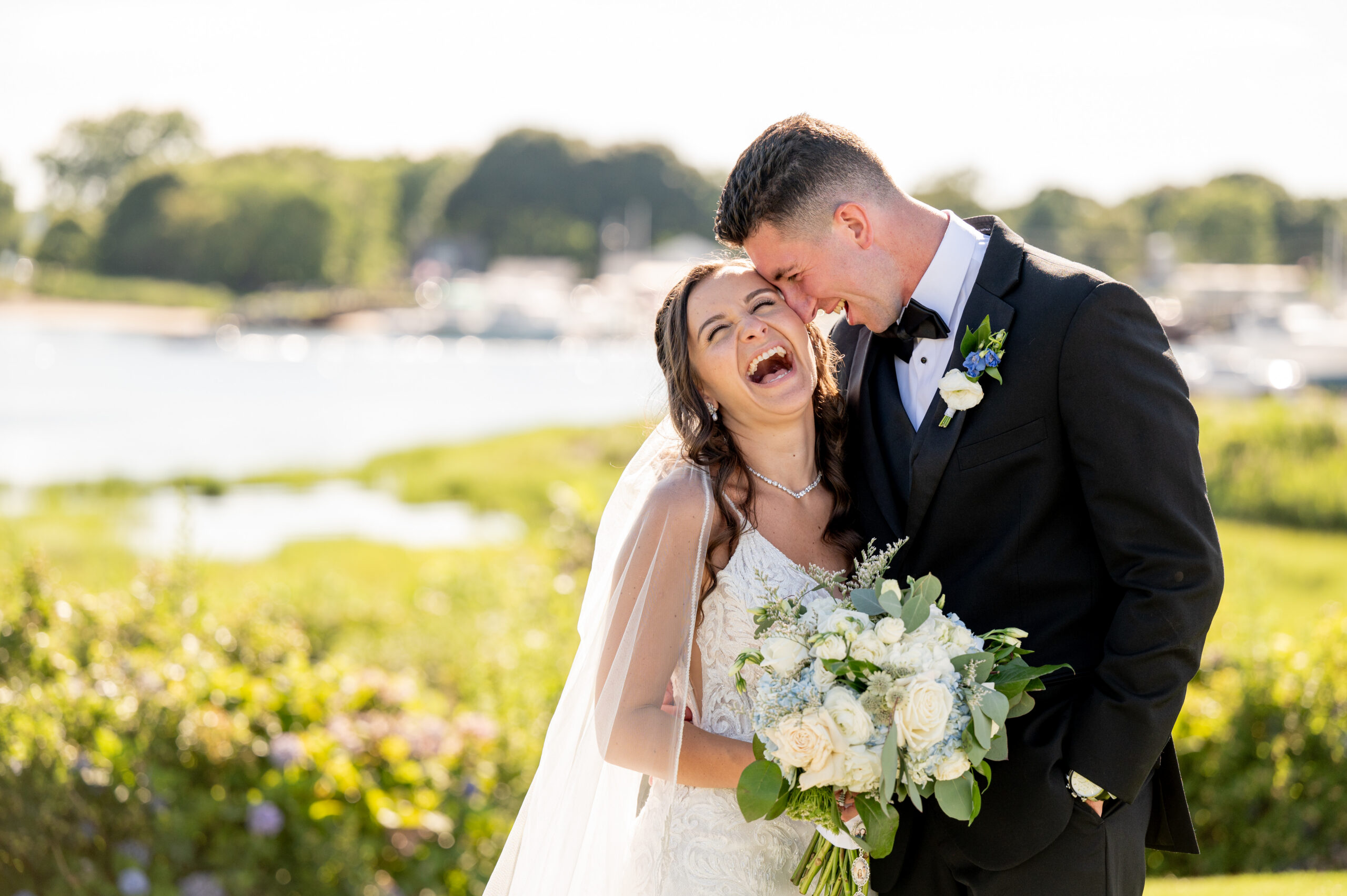 bride and groom laughing