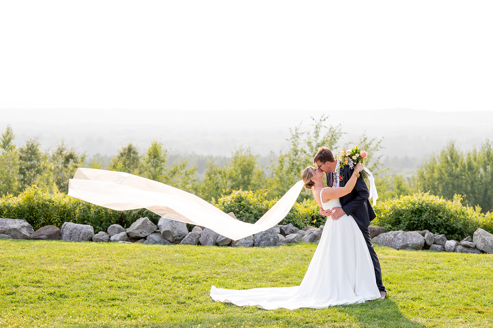 One of the best wedding veil for photos is one that allows the wind to pick it up and trail behind the bride