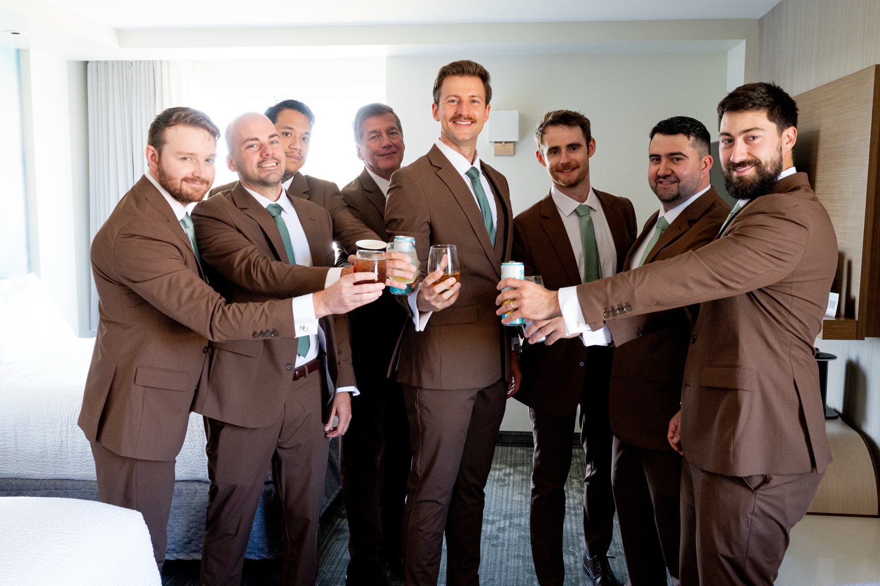 Groom toasting with groomsmen
