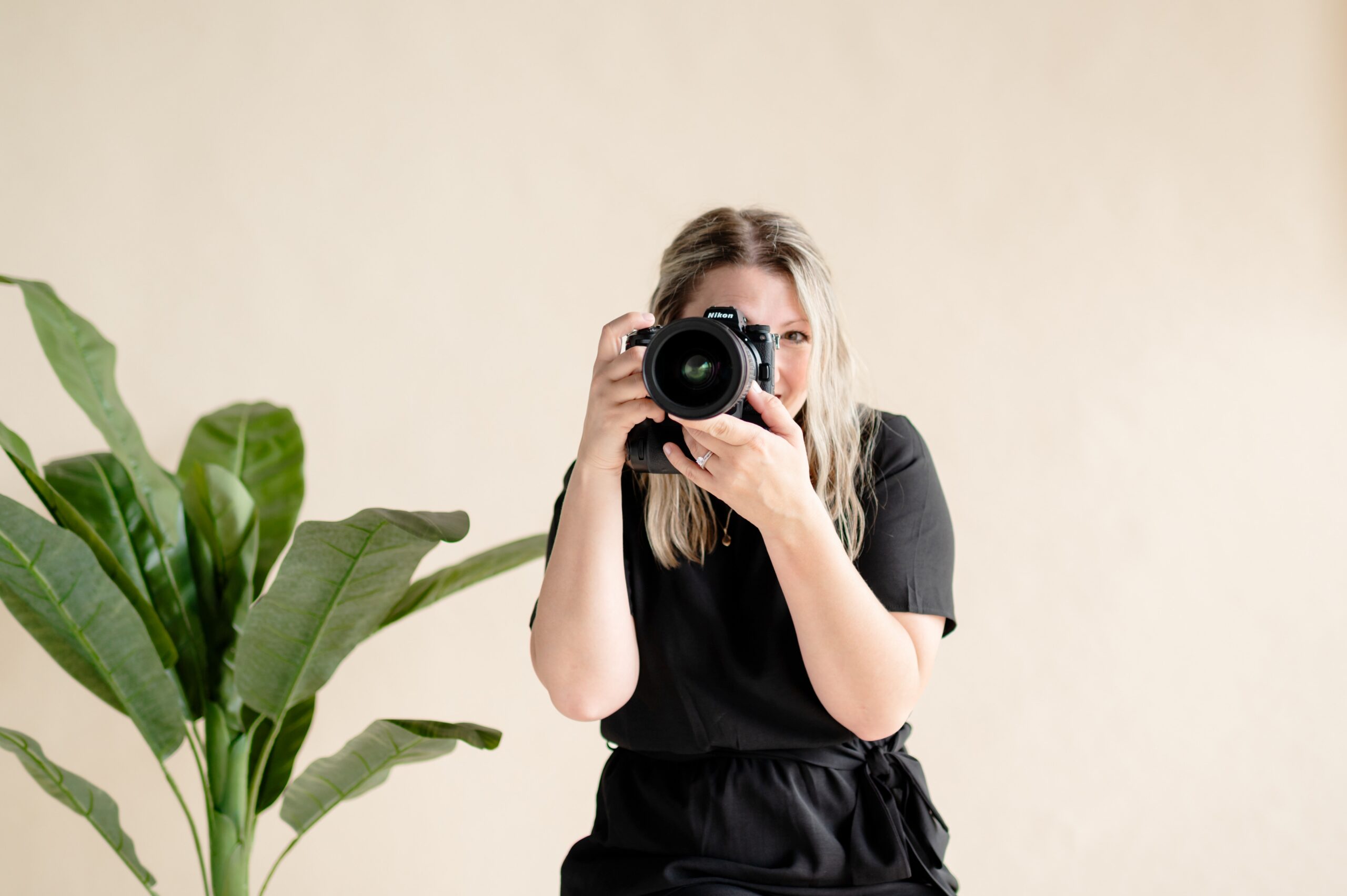 a photographer posing for her Branding Photography session